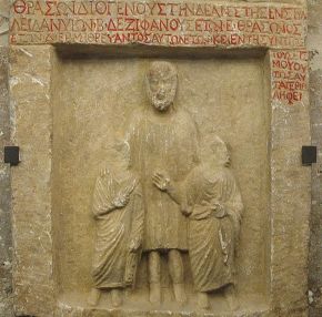 Ancient Greek slave accompanying two schoolboys